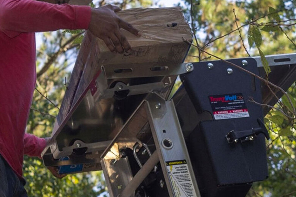 These roofing hoists can climb two stories in 15 seconds