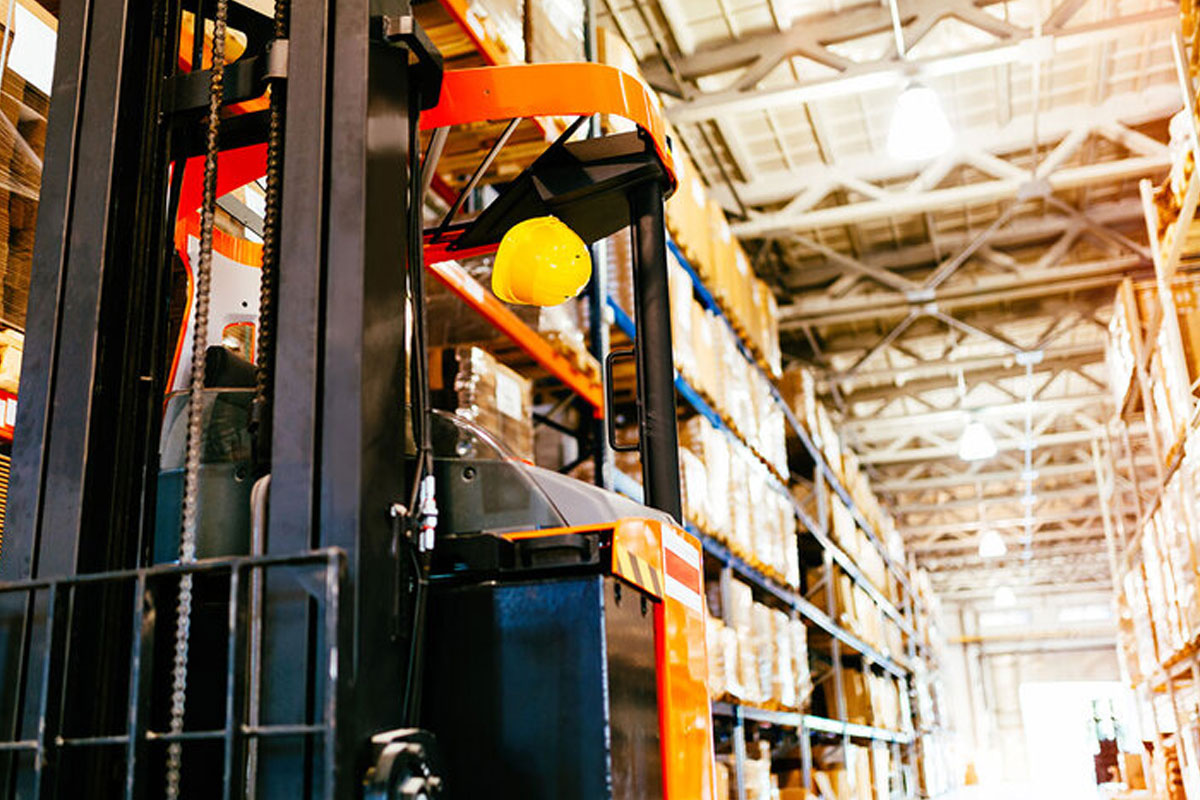 a photo of a forklift in a warehouse