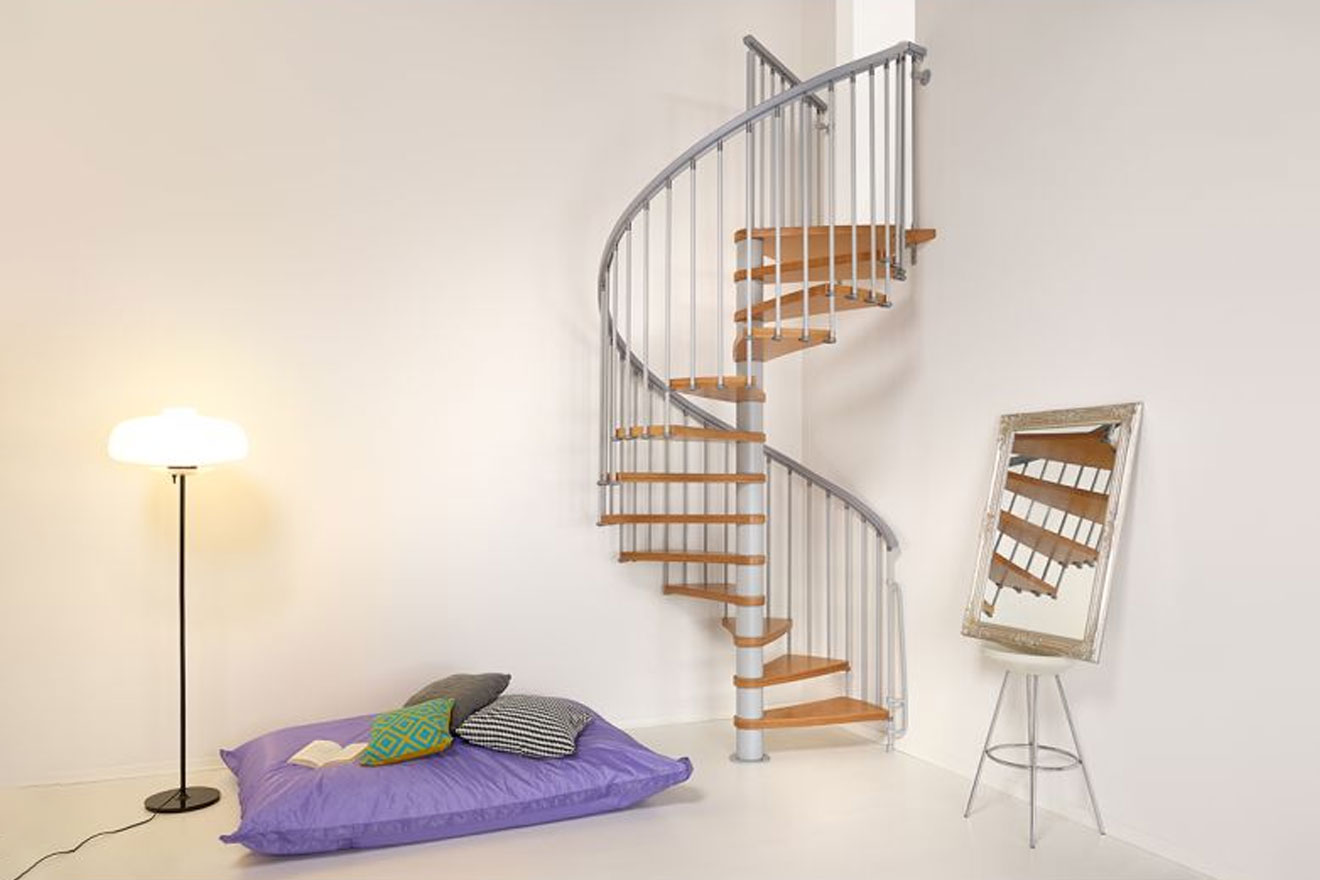 a photo of the Arke Nice spiral staircase in a stylish apartment