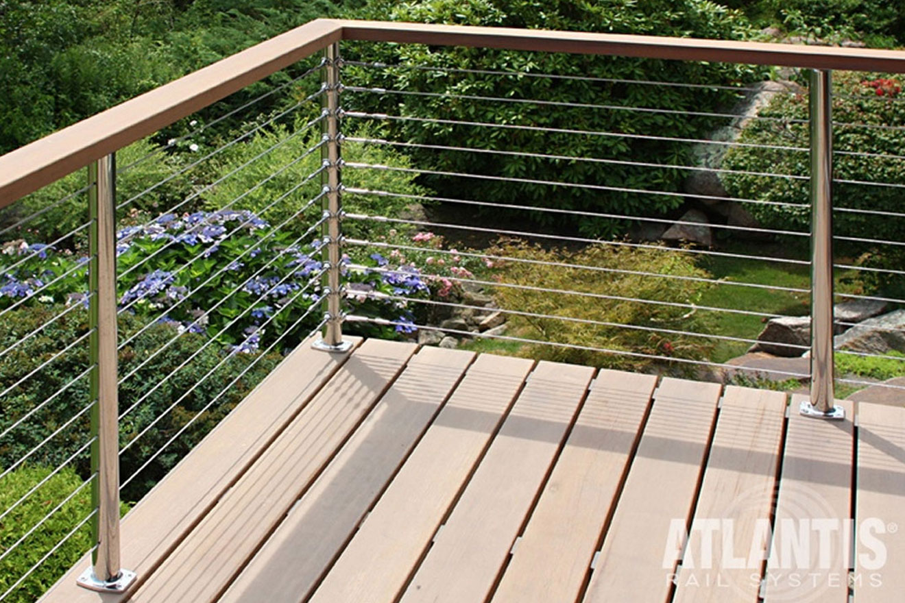 a photo showing a deck outfitted with Atlantist RailEasy cable railing