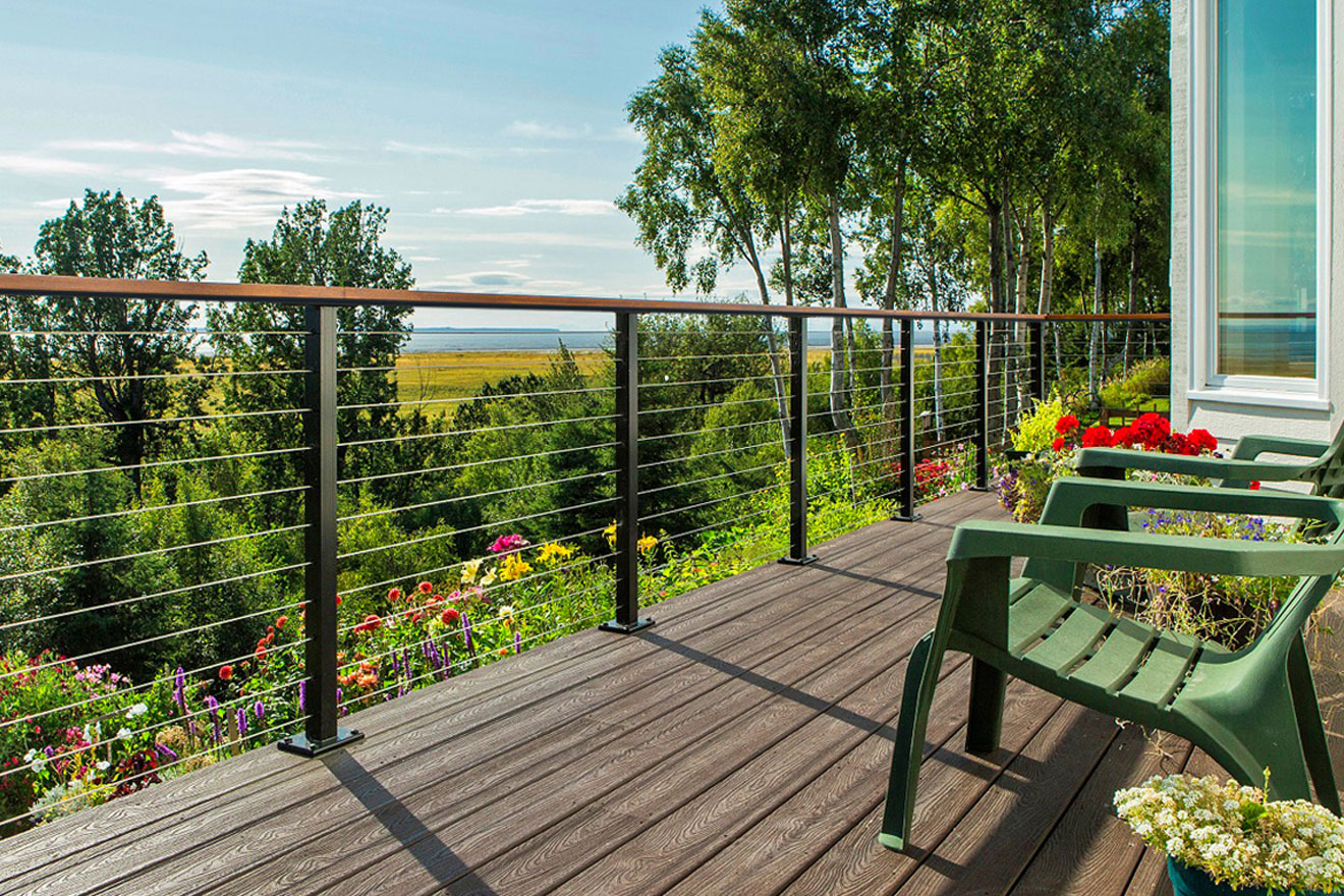 a photo of a cable railing system installed on a back porch